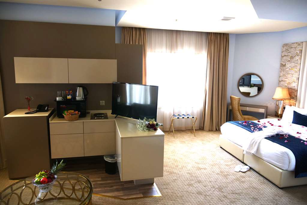 Lumiere Des Etoile Hotell Kuwait City Rom bilde