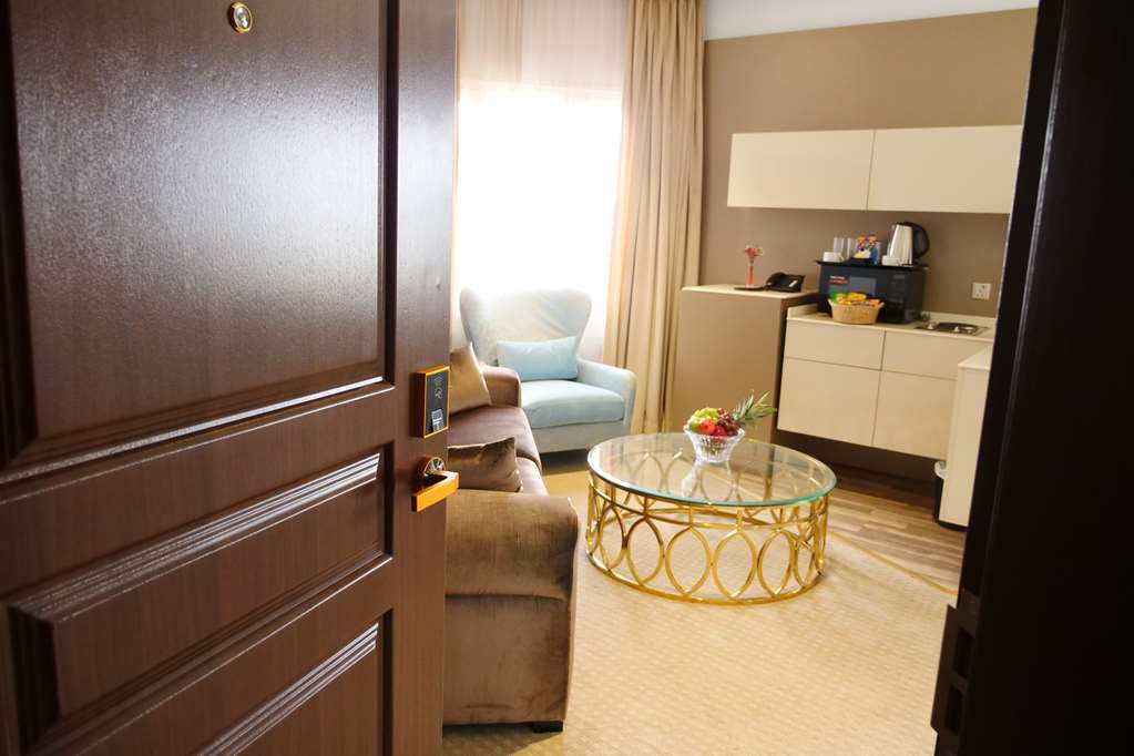 Lumiere Des Etoile Hotell Kuwait City Rom bilde