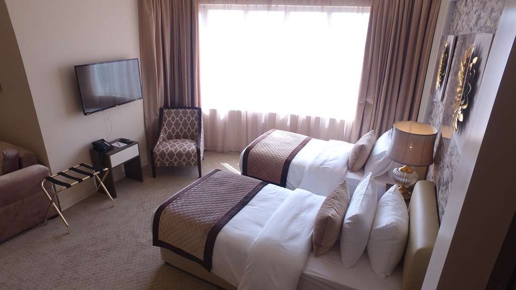 Lumiere Des Etoile Hotell Kuwait City Rom bilde